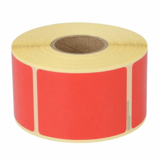 Roll of DYMO 99012 red labels on a white background
