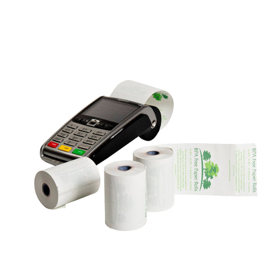 Box of BPA-free credit card rolls beside an Ingenico card terminal
