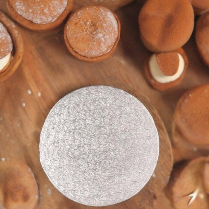 12 inch silver round cake card under baked goods