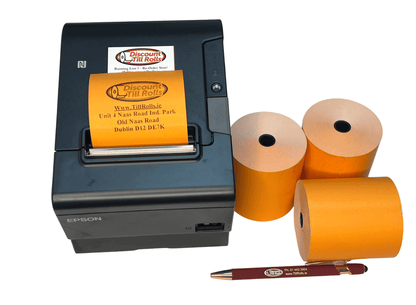 thermal printer printing a range thermal receipt with 3 orange till rolls at the side on a white back ground