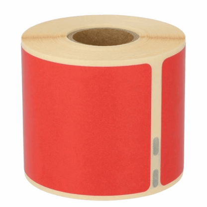 Roll of Dymo 99014 red labels on a white background
