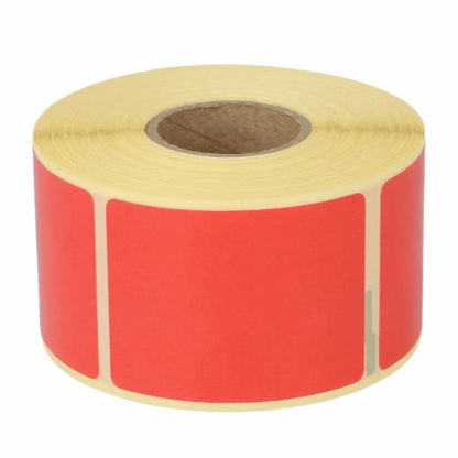 Roll of DYMO 99012 red labels on a white background