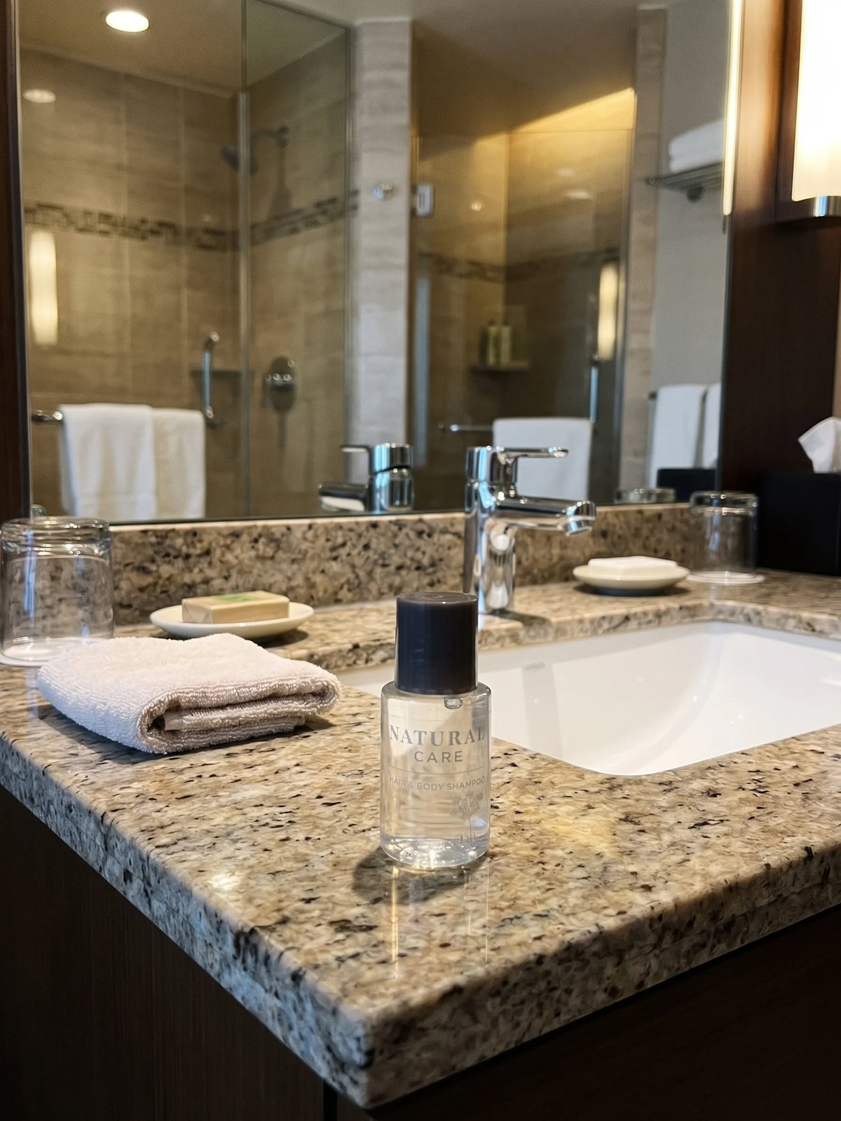 Natural Care Hair And Body Shampoo sitting on a sink