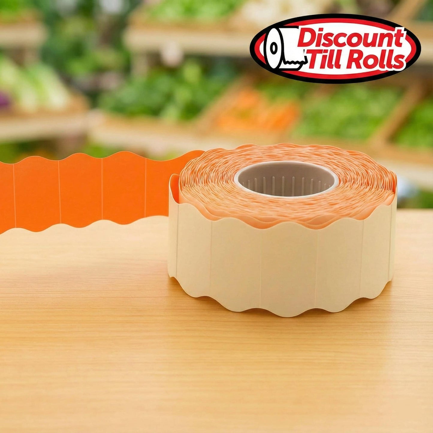 Roll of orange price gun labels on a wooden surface with 'Discount Till Rolls' logo in the background.