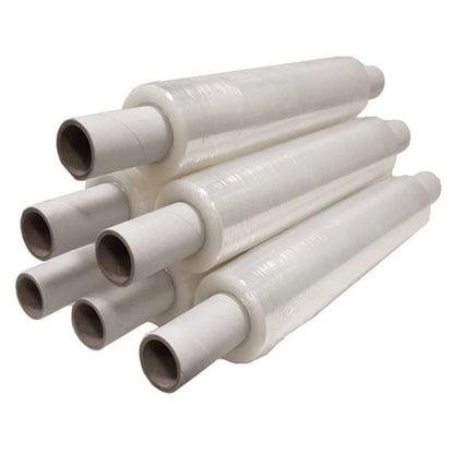 Multiple rolls of clear plastic wrap stacked on a white background