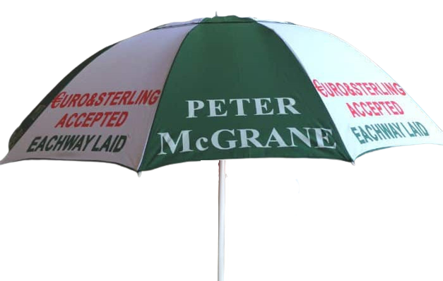 Green White bookmakers racecourse umbrella with 'Peter McGrane' branding on a white background
