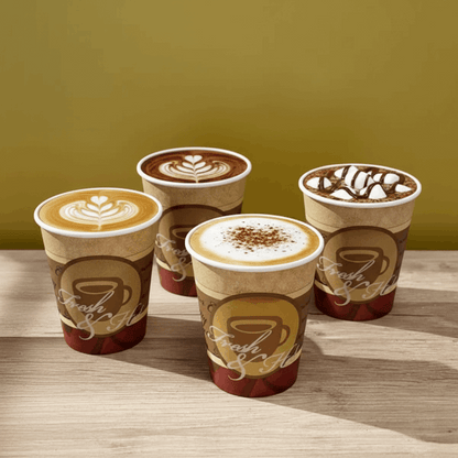 Fresh & Hot branded coffee cups filled with different coffees on a rustic wooden table