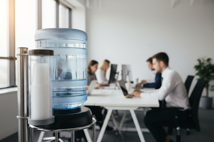 White PP cups beside water cooler in office setting